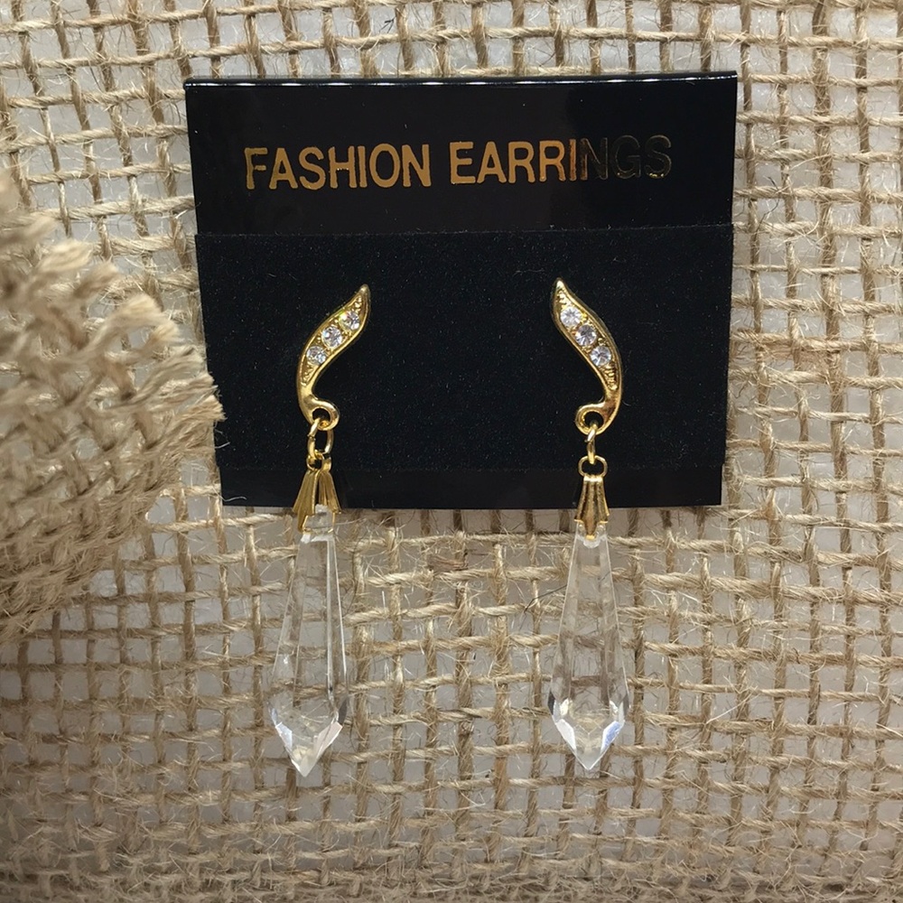 - Gold and clear earrings